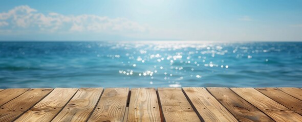 Empty wooden table top with blurred bokeh background of blue sea and sky for product display presentation template design, summer concept. Banner.