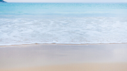 The sea of Thailand, calm and serene as the tide gently recedes.