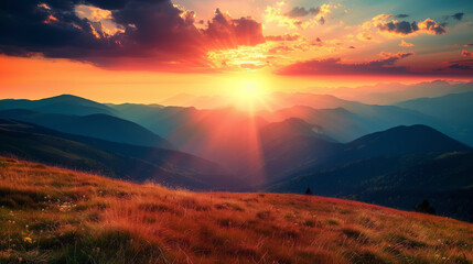 Obraz premium Sunset over a mountain silhouette