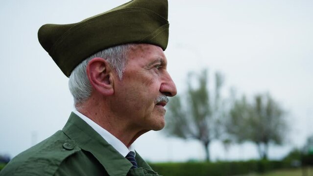 Sad And Moved Military General Silently Watches the Flag Raising on Memorial Day