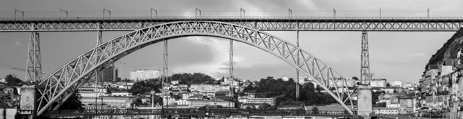 Frontal view from the river of the steel bridge Don Luis I. Douro river in Porto. Lisbon.