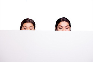 Close up photo pretty two people brown haired mum little daughter wondered eyes look down blank signboard reading poster wearing white t-shirts isolated bright blue background