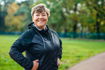 Fototapeta premium Senior woman geared up for fitness outdoors