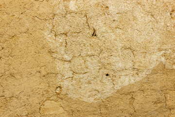 A close-up of a textured wall surface.
