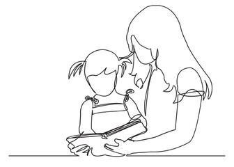 mother reads a book to her child