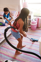 Girl, carpet and vacuum for cleaning in bedroom, house and at home for child development and...
