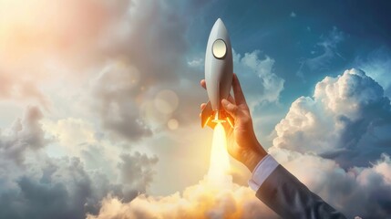 Businessman holding rocket while launching. Startup success, business innovation, modern technology concept background with free place for text - obrazy, fototapety, plakaty