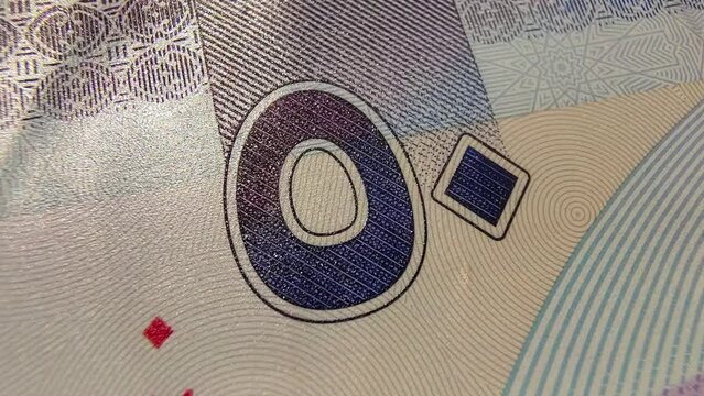 United Arab Emirates dirham (AED) national central bank currency note extreme closeup macro top view. UAE recession, inflation, economy, international money, investment, loan and reserve cash concept.