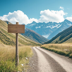 Wooden signpost on a mountain trail with blue sky and clouds