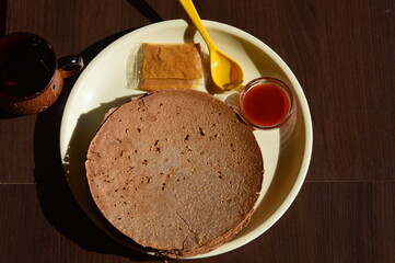 Indian Khakhra is a Traditional Gujarati snack also know as khakra, crispy roti or ragi khakra, khakra are thin crackers made from wheat flour and oil. It is served usually during breakfast