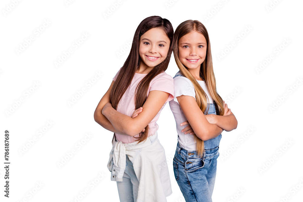 Wall mural Portrait of nice-looking cute lovely sweet well-groomed attractive cheerful cheery straight-haired girls standing back to back siblings folded arms isolated over blue pastel background