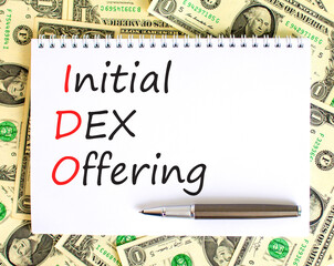 IDO initial DEX offering symbol. Concept words IDO initial DEX offering on beautiful white note....