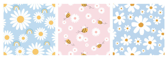 Fototapeta na wymiar Seamless pattern with daisy chamomile flower, bee cartoons and rainbow on blue and pink backgrounds vector. Cute fabric print.