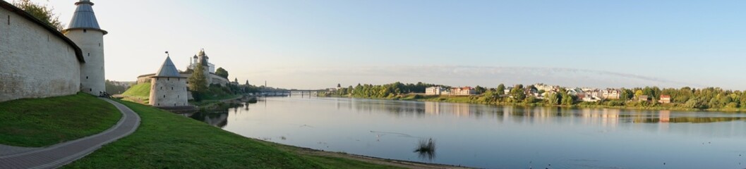 Pskov, Russia, September 11, 2023. Autumn panoramic view of the river and the walls of the...