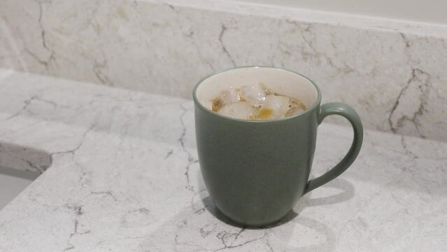 Parallax spin around the mug and coffee.