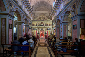 Easter mass at Biserica San Salvatore alle Coppelle, Romanian medieval church in Rome, Italy - obrazy, fototapety, plakaty