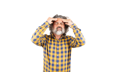 A man with a beard and a plaid shirt complains of a headache. Headache