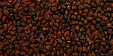 Pine nuts in shells background closeup, top view