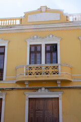 Old yellow house in a Spanish town - 786218061