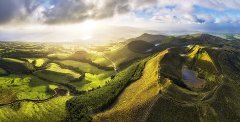 Azores - Aerial view of the volcanic mountains and lakes, with green farmland of Sete Cidades on...