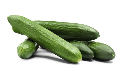 Many long fresh cucumbers isolated on white