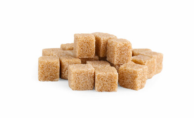 Pile of brown sugar cubes isolated on white