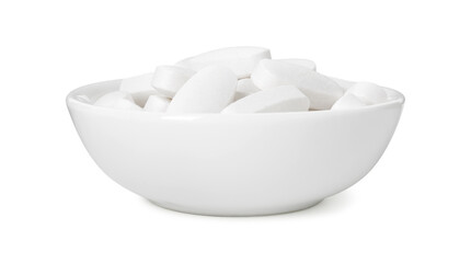 Vitamin pills in bowl isolated on white. Health supplement
