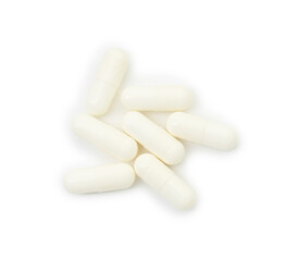 Vitamin capsules isolated on white, top view. Health supplement