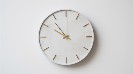 Minimalist white wall clock with golden hands and markers on a white background.