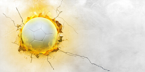 A soccer ball breaks through a cement wall.