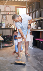 Home, family and kid cleaning or sweep, garage and broom for dust or dirt remove. Happy, playful...