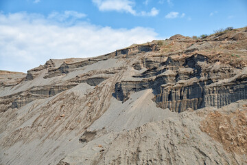Sand quarry in Altai. Extraction of sand for road works on the ancient terrace of the Katun River - 786232646