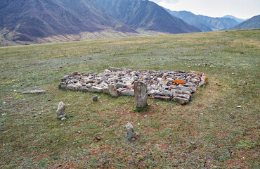 Ancient burials in the Altai mountains. This place is a terrace of the Katun and Bolshoy Yaloman rivers.