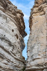 Natural walk next to the júcar river, popular cave houses, carved into the mountain,  region of La Manchuela, in Alcalá del Júcar (Albacete, Spain).