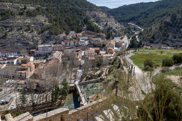 Fototapeta premium Alcalá del Júcar castle is located on a rock formed by the gorge of the Júcar River, from where the entire town can be seen, in the province of Albacete, La Manchuela, Castila la Mancha, Spain