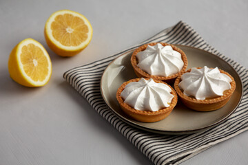 Homemade Lemon Tartlets on a Plate, side view. - 786247072