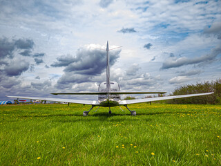 Airplane on the runway grass