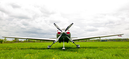 Airplane on the runway grass