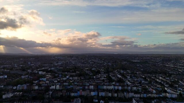 Bristol city centre, UK cityscape during evening, golden hour, sunset filmed by 4K drone