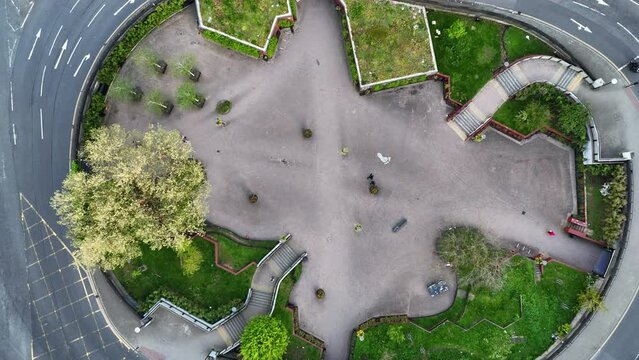 The Bearpit, officially St James Barton roundabout, Bristol, UK with smooth traffic flow by 4K drone