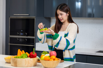 Diet lose weight and foods concept - Asian young attractive woman making sandwich clean vegetables healthy food for breakfast in morning at home.  healthy food for health