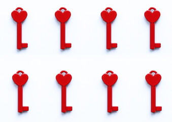 red heart shaped keys on a white background pattern, valentine´s concept