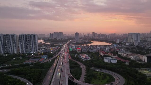 Aerial drone skyline view of Hanoi cityscape at sunset in Belt Road No.3