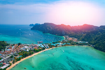 Aerial view landscape longtail boat on Phi Phi island from drone, travel landmark of Thailand
