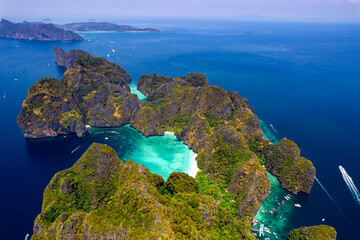 Concept touristic landmark of Thailand, travel photo by drone. Amazing aerial view of Ko Phi Phi...