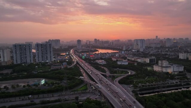 Aerial drone skyline view of Hanoi cityscape at sunset in Belt Road No.3