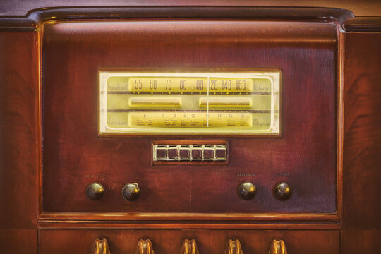 Early twentieth century wooden tube radio with illuminated display