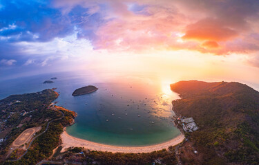 Beautiful panorama Rawai Phuket, sunset on Nai Harn beach and blue sea, travel paradise Thailand,...