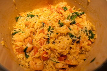 A pot of prawn risoni pasta.