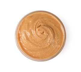 Delicious nut butter in bowl isolated on white, top view